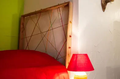Tête de lit en cordage chambre nichoir